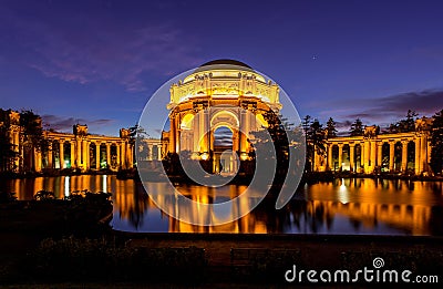 Breathtaking view of the Palace of Fine Arts in San Francisco at night with bright orange lights Editorial Stock Photo
