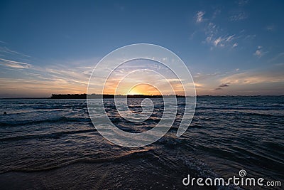 Breathtaking view of the sea under the beautiful sunset captured in Pipa, Brazil Stock Photo