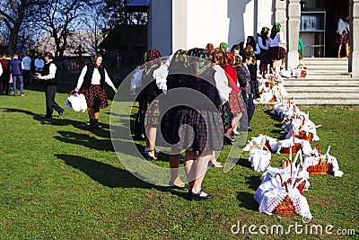 BREB, ROMANIA - 29 APRIL, 2019 - Local peasants dressed in traditional clothes, celebrating the Easter Holidays, Maramures. Editorial Stock Photo