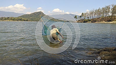 Brebes Indonesia - 8 Januari 2021 : Working to find fish for life in a COVID-19 pandemic situation Editorial Stock Photo