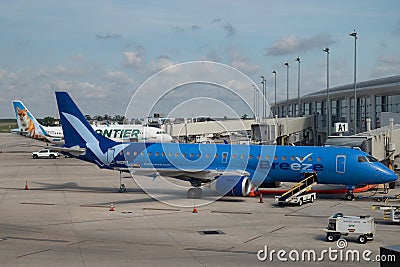 Breeze Airways Plane at a Gate at Louis Armstrong New Orleans International Airport Editorial Stock Photo