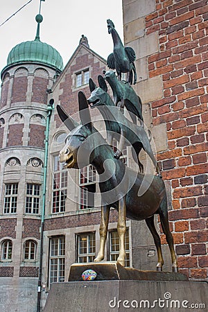 Bremen, Germany - 06/13/2019: famous sculpture of Bremen musicians. Bronze monument of fairytale animals. Grimm brothers heritage. Editorial Stock Photo