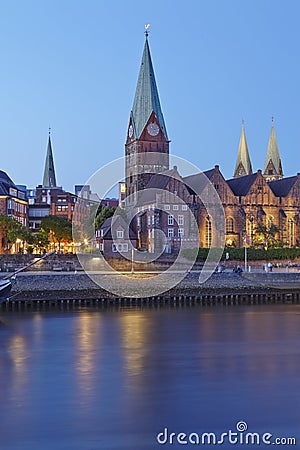 Bremen, Germany - Schlachte-Riverside and Martini-Church in the evening Editorial Stock Photo