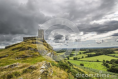 brentor church with moody stormy grey sky Stock Photo