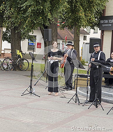 Brest, Belarus - 08.25.2023 - Jazz street band performing for public. Entertainment Editorial Stock Photo