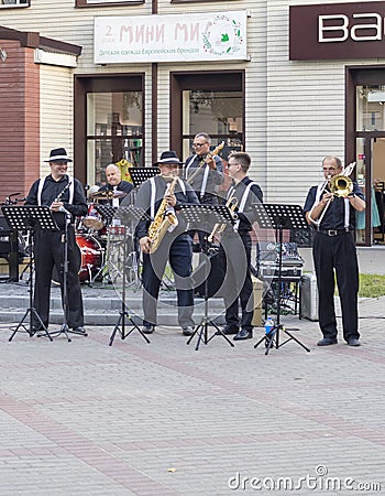 Brest, Belarus - 08.25.2023 - Jazz street band performing for public. Entertainment Editorial Stock Photo