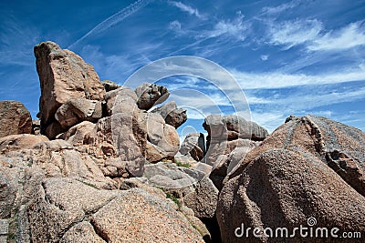 Bretonic Coast and Beach with Granite Rocks at the Cote de Granit Rose - Pink Granite Coast Stock Photo