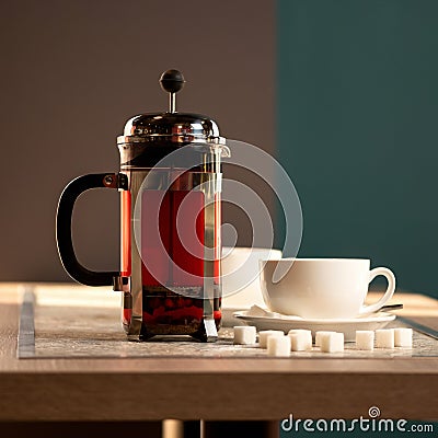 Brewed black tea. Full teapot or french press of hot drink on wooden table with teacup and lumps of sugar on it. Objects Stock Photo