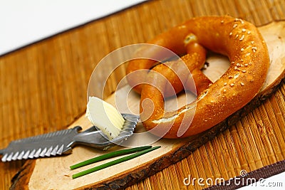 Brezel with butter Stock Photo