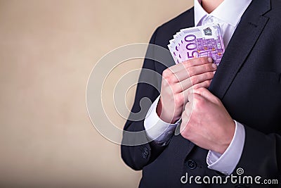 Bribe and corruption with euro banknotes. Stock Photo