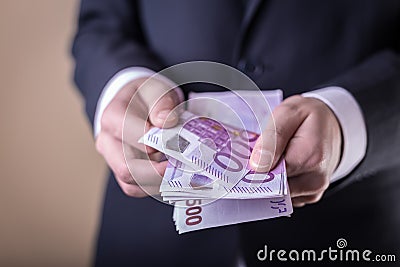 Bribe and corruption with euro banknotes. Stock Photo