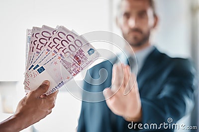 Bribe, money and fraud businessman stop hands for money laundering, corruption and business deal exchange. Crime, ethics Stock Photo