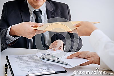 Bribery and corruption concept, bribe in the form of dollar bill Stock Photo
