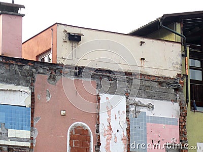 Brick building under demolition. Stock Photo