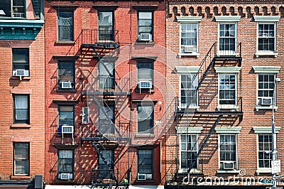 Brick buildings with outside fire escape stairs, USA Stock Photo