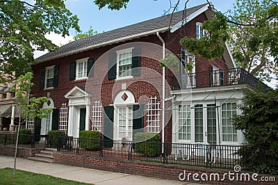Brick Colonial Home Stock Photo