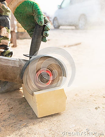 Brick cutting machine for work Stock Photo