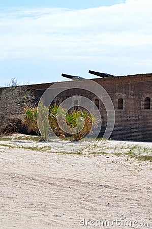 Brick fort with two cannons atop wall Stock Photo