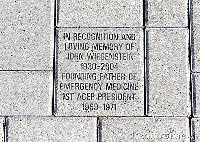 Brick in honor of John Wiegenstein, EMF Plaza, National ACEP Headquarters, Dallas, Texas Editorial Stock Photo