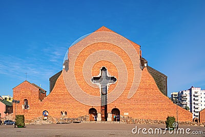 Brick modernistic facade of the Holy Ascension church in Stoklosy district of Warsaw, Poland, in Ursynow part of the city Editorial Stock Photo