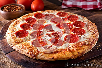 Brick Oven Baked Pepperoni Pizza Stock Photo