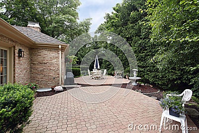 Brick patio with rock garden Stock Photo