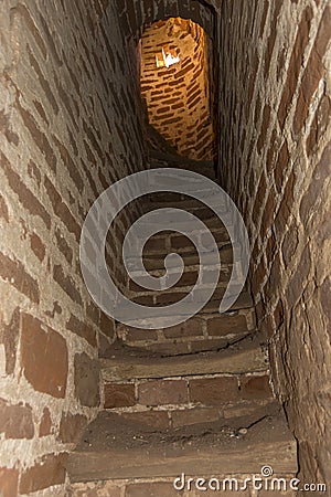 Brick staircase to the old Church leading to the bell tower Stock Photo