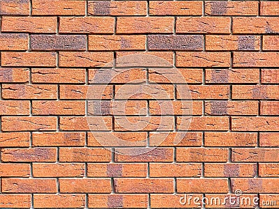 brick wall background. abstract background texture with decorative smooth red brickwork. Stock Photo