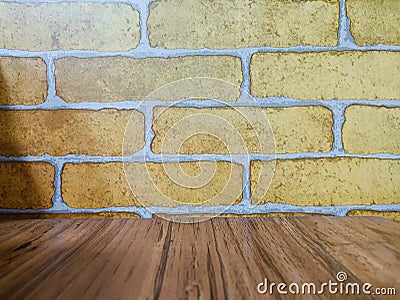 Brick wall background with wooden floor... Stock Photo