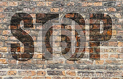 Brick wall with the word Stop written in 3D. Stock Photo