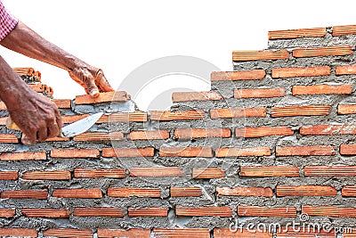 Bricklayer building wall concrete isolated on white background Stock Photo