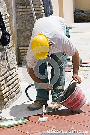 Bricklayer at work Stock Photo
