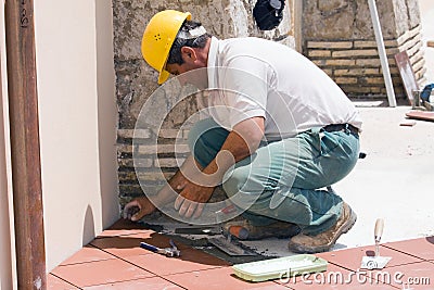 Bricklayer at work Stock Photo