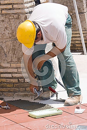 Bricklayer at work Stock Photo