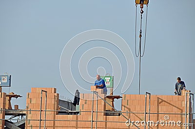 Bricklayer at work Editorial Stock Photo