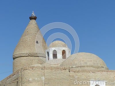 Bricks domes of the ancient mausoleum Chashma Ayub to Bukhara in Uzbekistan. Editorial Stock Photo