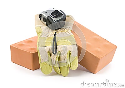 Bricks, glove and tapeline Stock Photo
