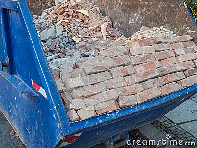 Bricks rubble container waste image Stock Photo