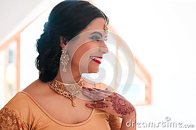 Bridal style to swoon over. a beautiful young woman getting ready for her wedding. Stock Photo