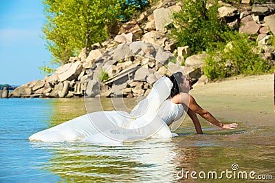 Bride on the beach Stock Photo