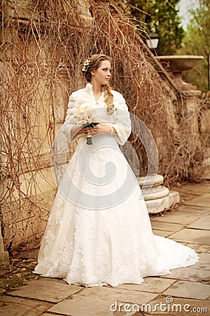 Bride beautiful woman in wedding dress - outdoor portrait Stock Photo