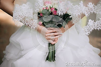 Bride boho style. Those girls are not seen are only visible hand Stock Photo