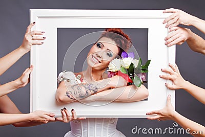 Bride with bouquet in frame Stock Photo