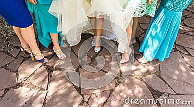 Bride and bridesmaids legs Stock Photo