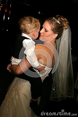 Bride dancing with son Stock Photo