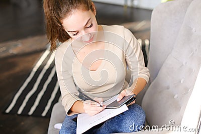 Bride execute documents to get visa for honeymoon. Stock Photo