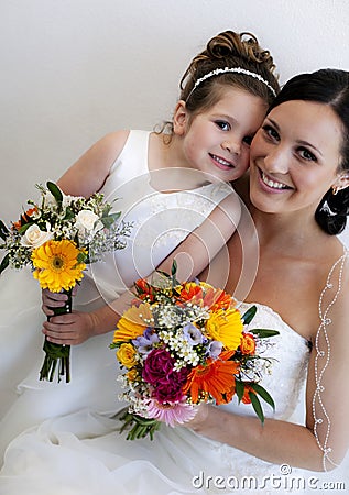 Bride and flower girl Stock Photo