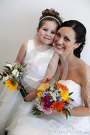 Bride and flower girl Stock Photo