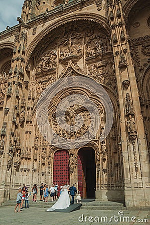 Bride on the front door of the New Cathedral at Salamanca Editorial Stock Photo