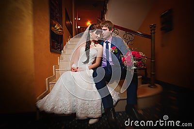 Bride and groom in the classic english interior Stock Photo